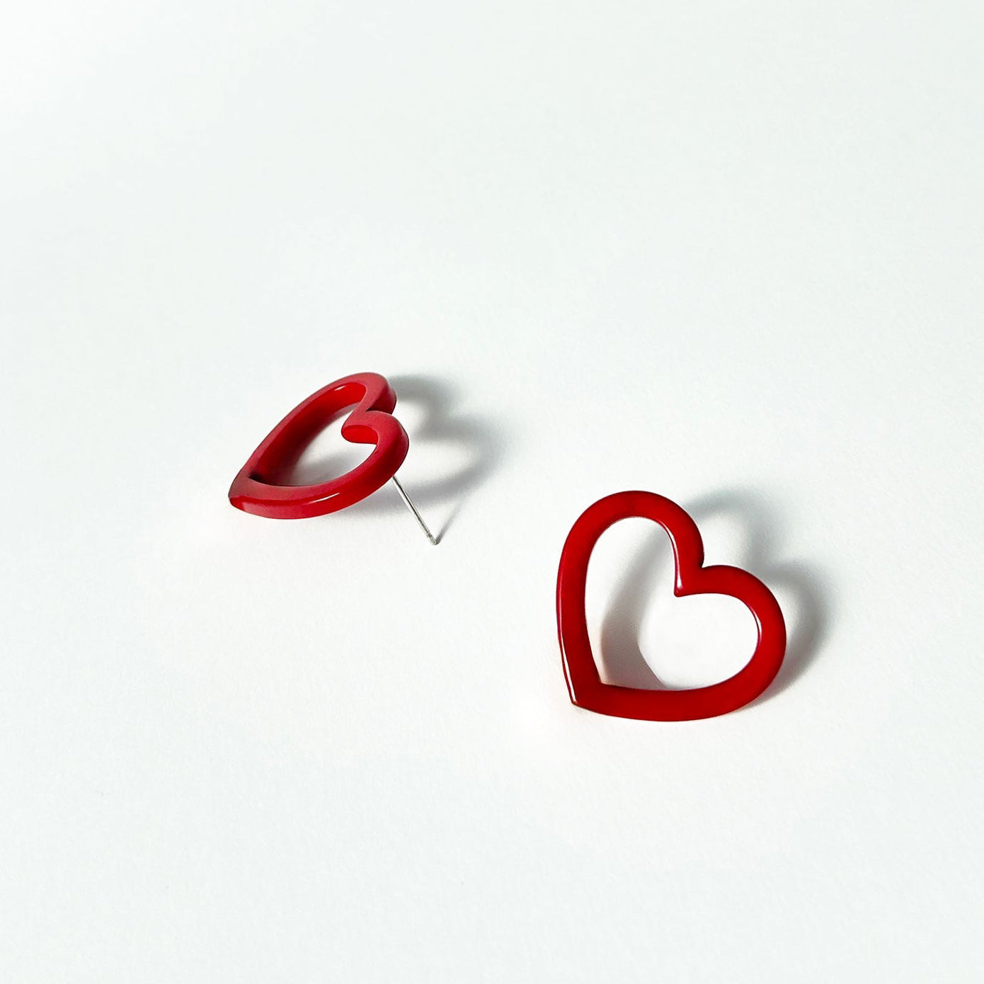 Heart shaped tagua nut silhouette colourful earrings