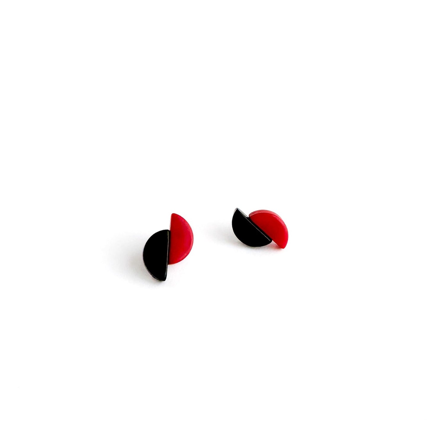 Asymmetric and contrasting colour earring studs made with handmade tagua nut beads