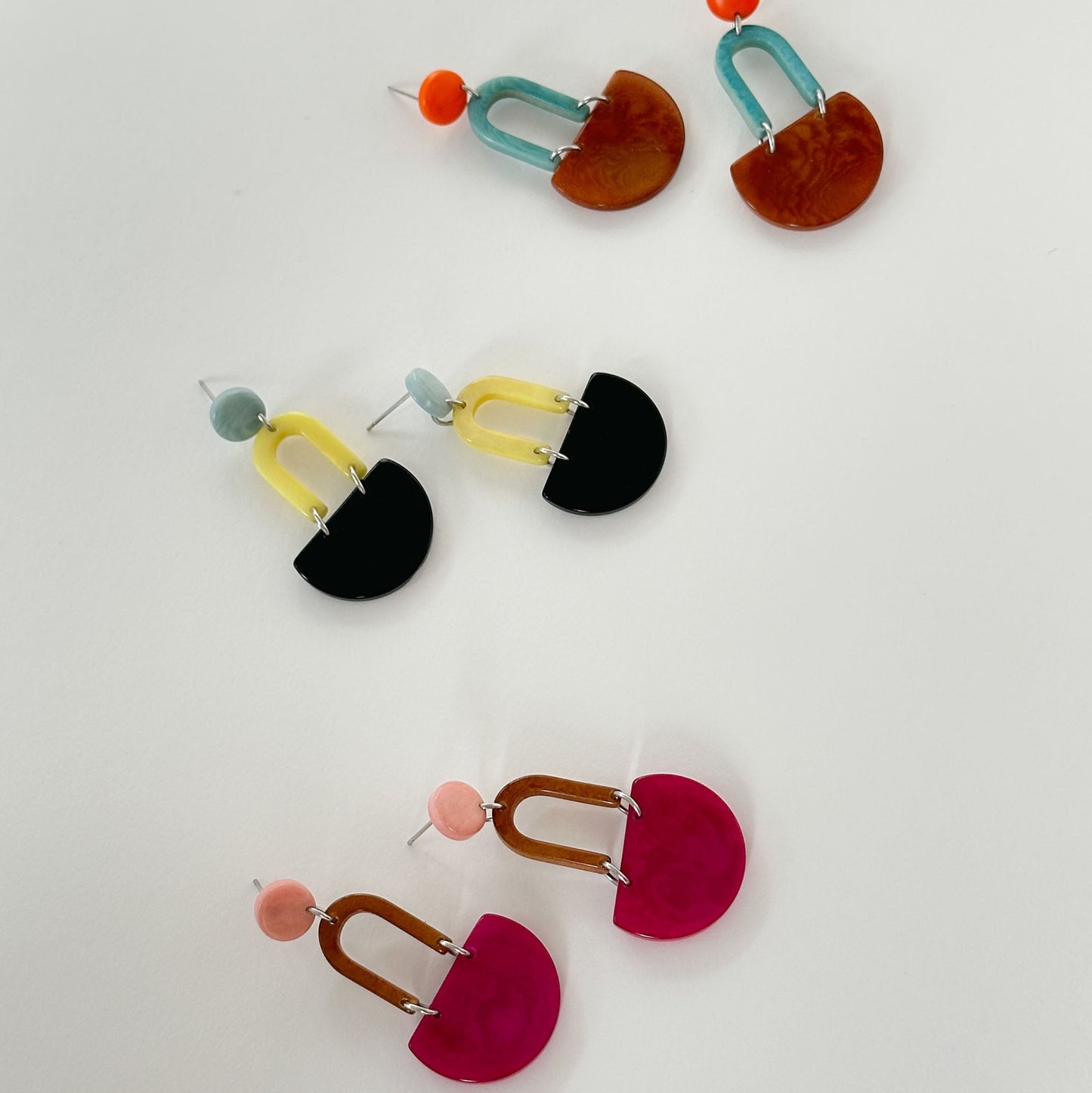 Colourful dangling earrings made with tagua nut beads