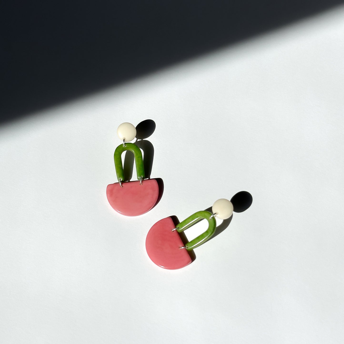 Colourful dangling earrings made with tagua nut beads