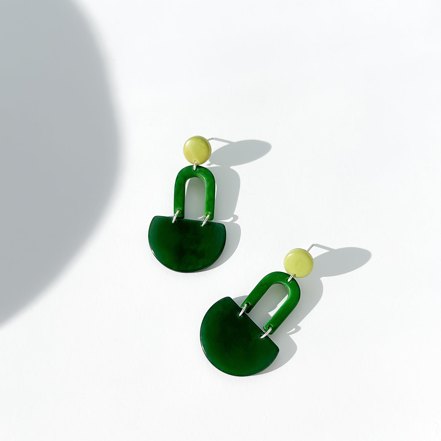 Colourful dangling earrings made with tagua nut beads
