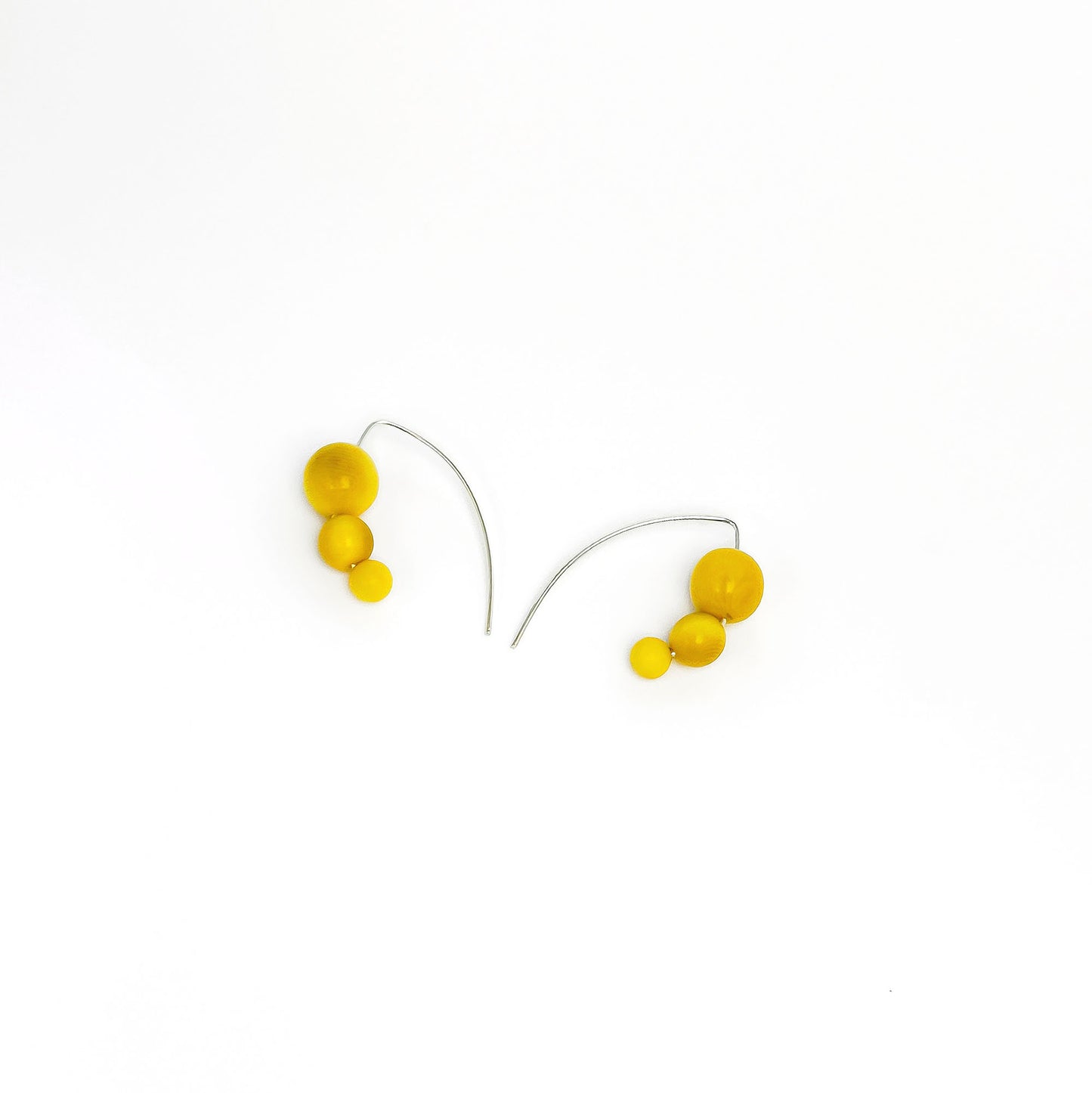 Handmade sterling silver hook earrings with organic tagua nut beads