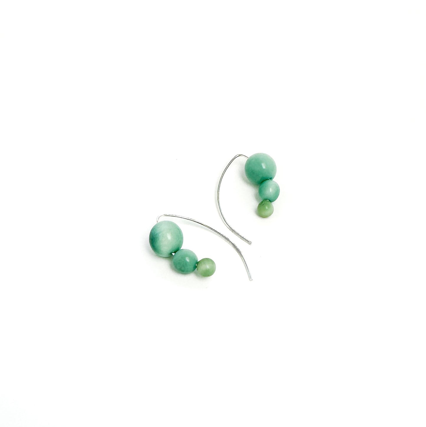 Handmade sterling silver hook earrings with organic tagua nut beads