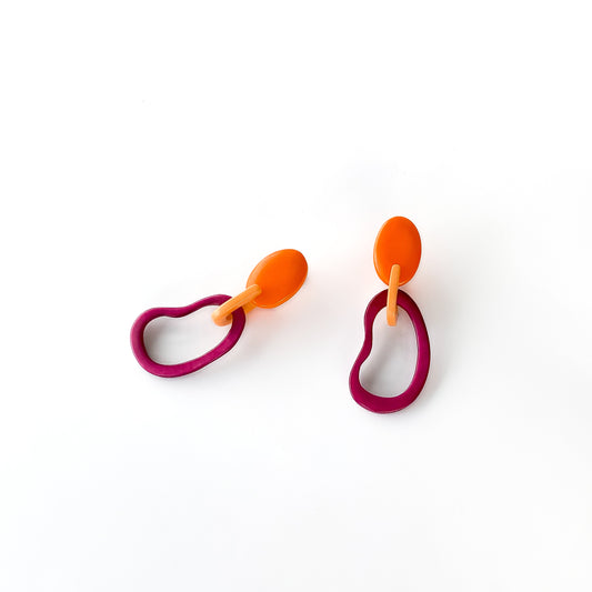 Bold, colourful, dangling tagua nut earring