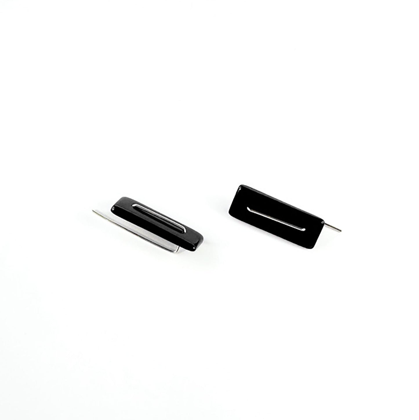 Modern laser cut tagua earrings with a handmade sterling silver hook which is attached without the use of glue.