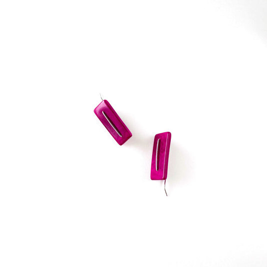 Modern laser cut tagua earrings with a handmade sterling silver hook which is attached without the use of glue.