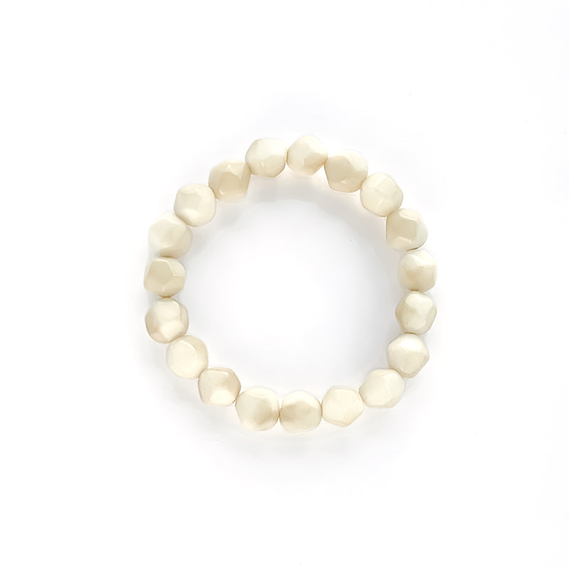 Modern colourful and organic design bracelets, made with sustainable tagua nut / vegetable ivory