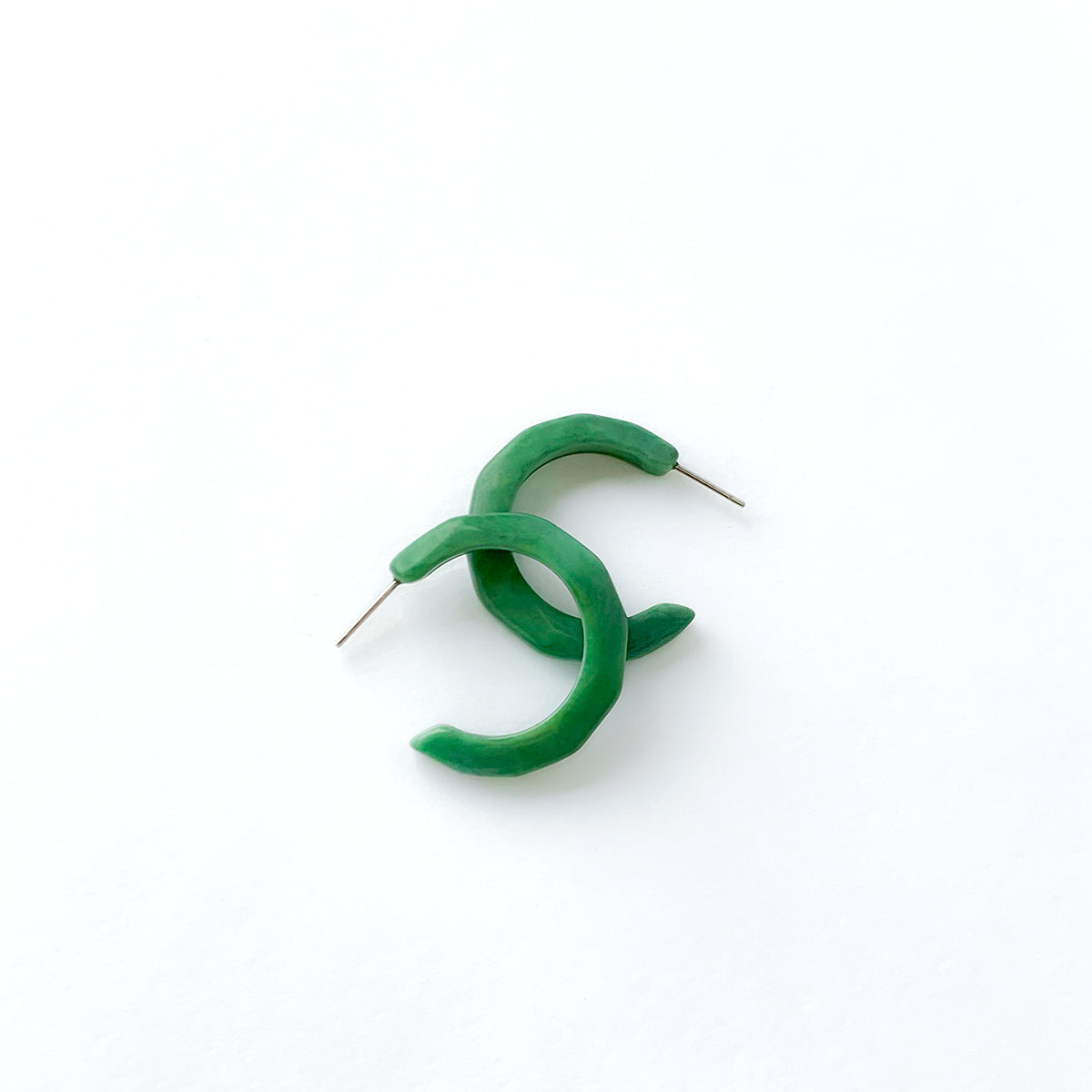 Half-moon shaped earring hoop handmade with tagua nuts