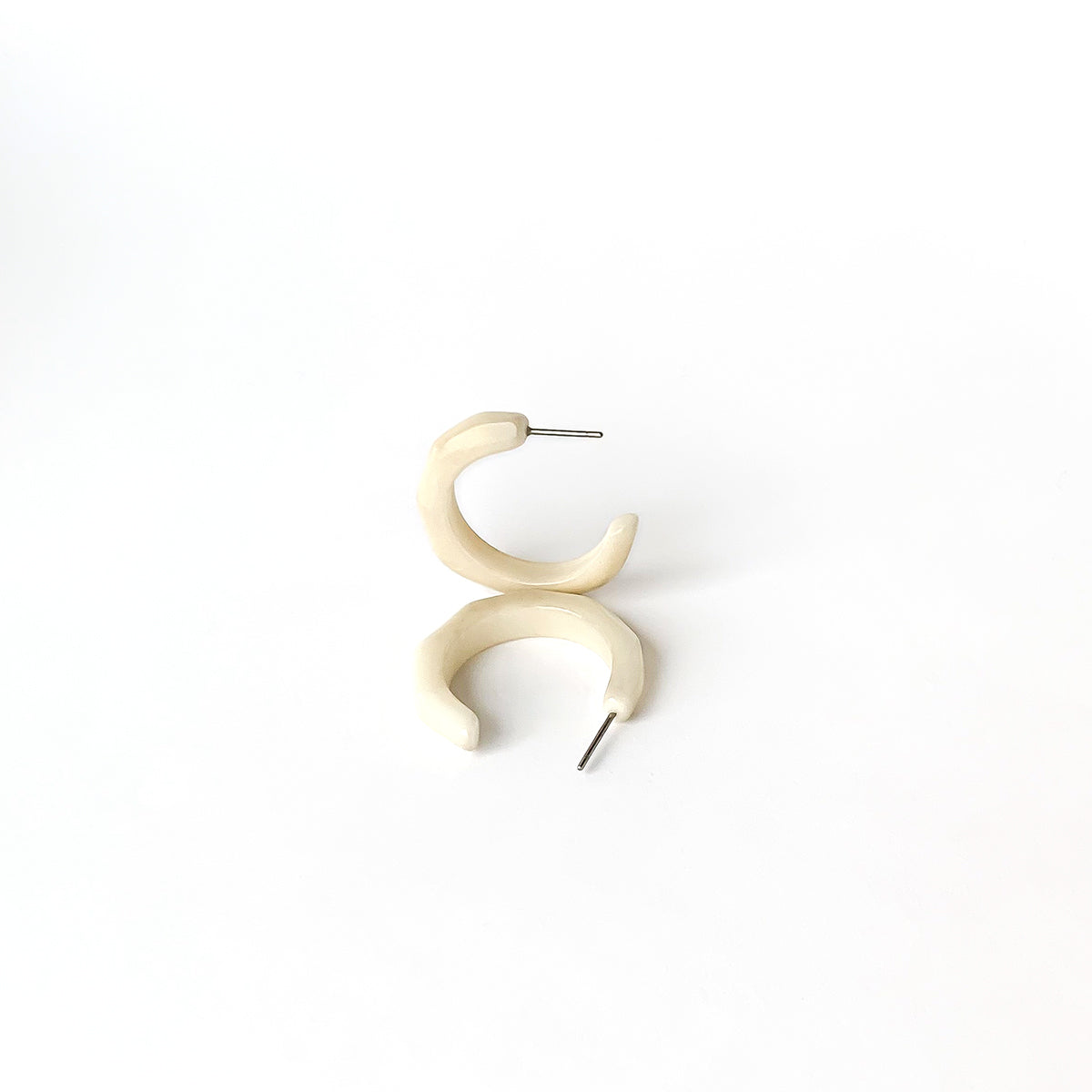 Half-moon shaped earring hoop handmade with tagua nuts
