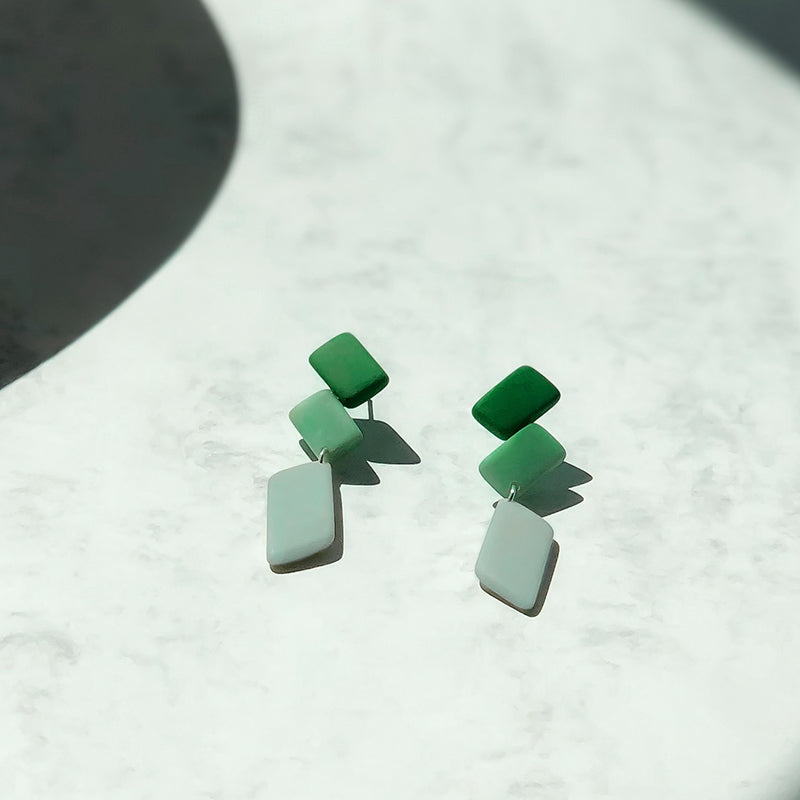 Architectonic and Colourful, long, dangling earrings made with handmade tagua nut beads, inspired by Nasjonal Museet Oslo