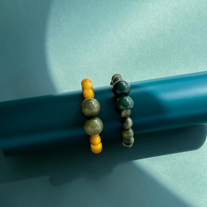 Bracelets handmade with tagua nut spheres in bright colours