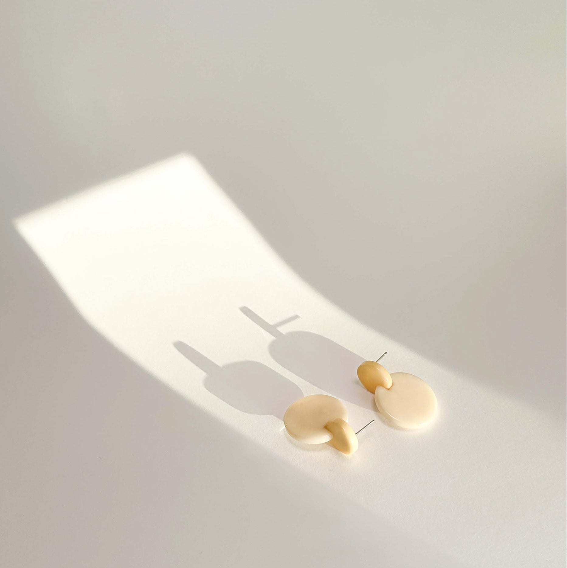 Colourful dangling earrings made with tagua nut beads