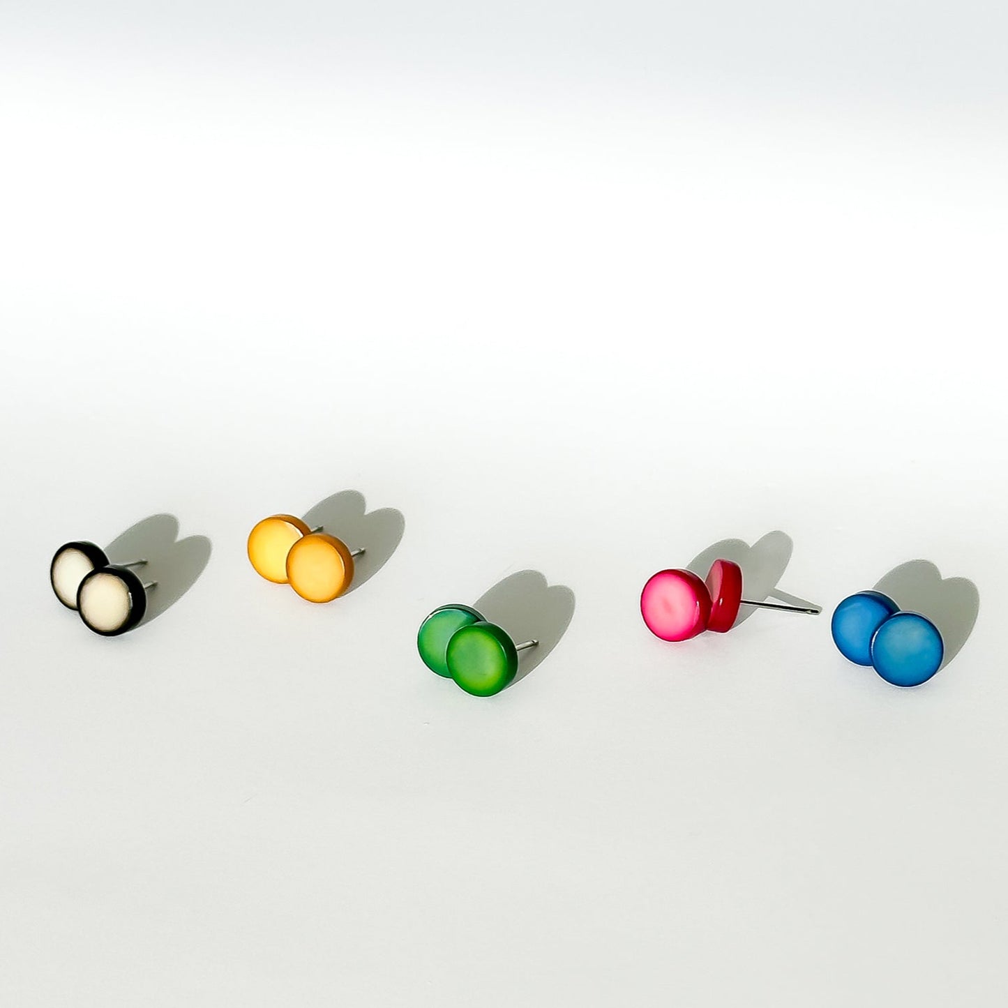 Modern colourful and organic design earrings, made with sustainable tagua nut / vegetable ivory