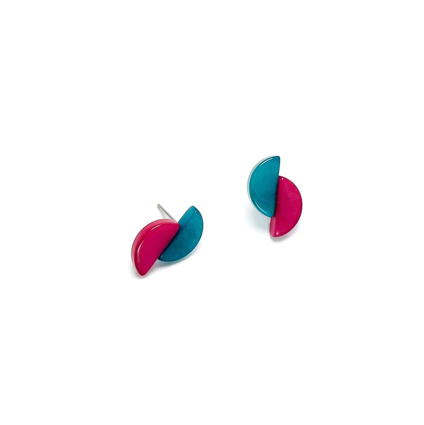 Pair of tagua nut earrings with aqua blue and pink half-circle design on a white background