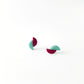 Asymmetric and contrasting colour earring studs made with handmade tagua nut beads