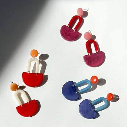 Colourful dangling earrings made with tagua nut beads