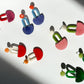 Colourful dangling earrings made with tagua nut beads