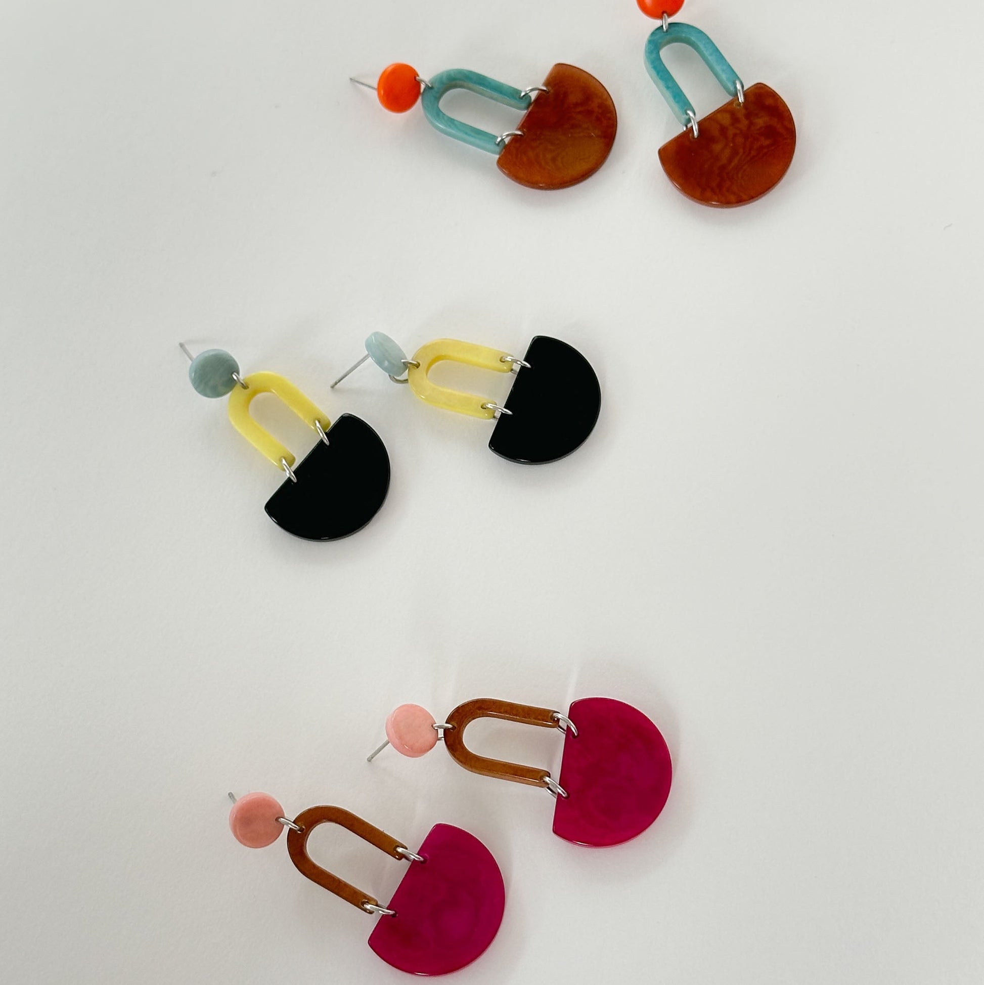 Colourful dangling earrings made with tagua nut beads