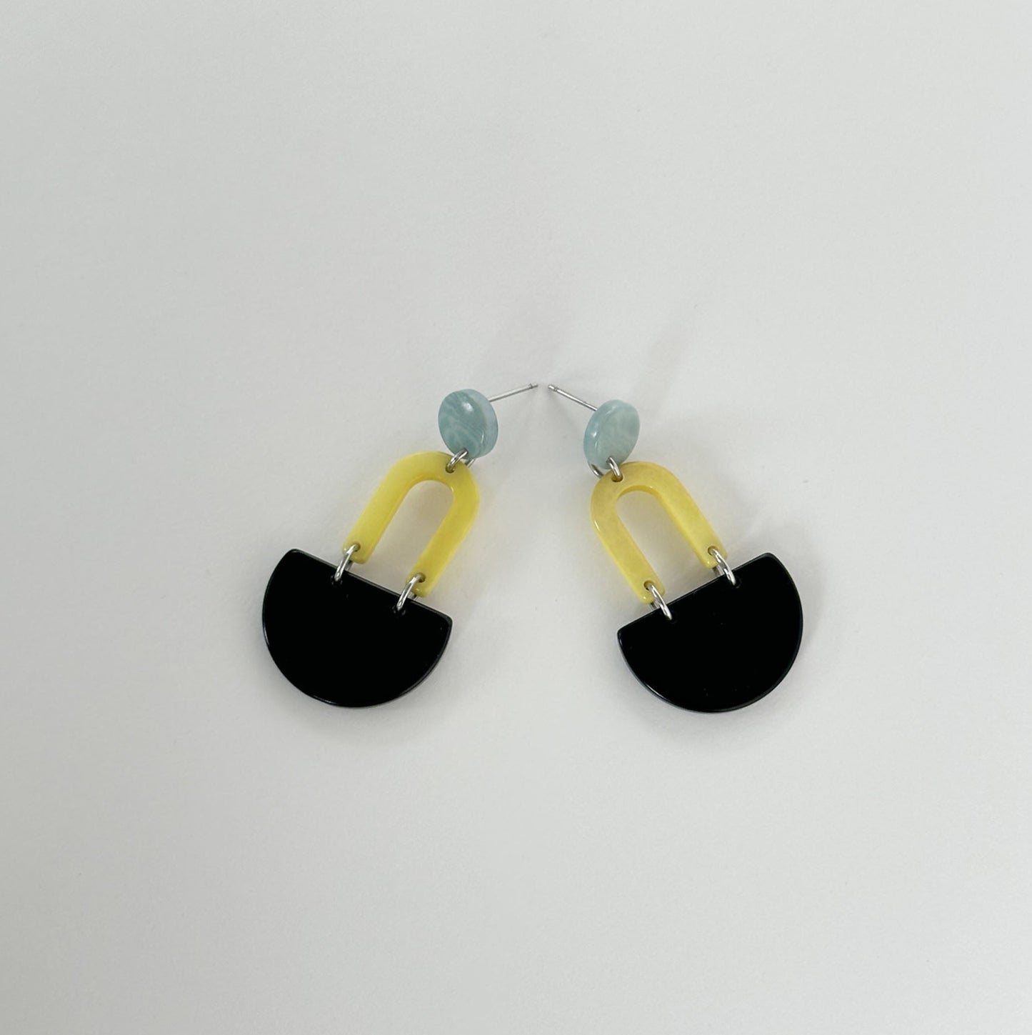 Colourful dangling earrings made with tagua nut beads
