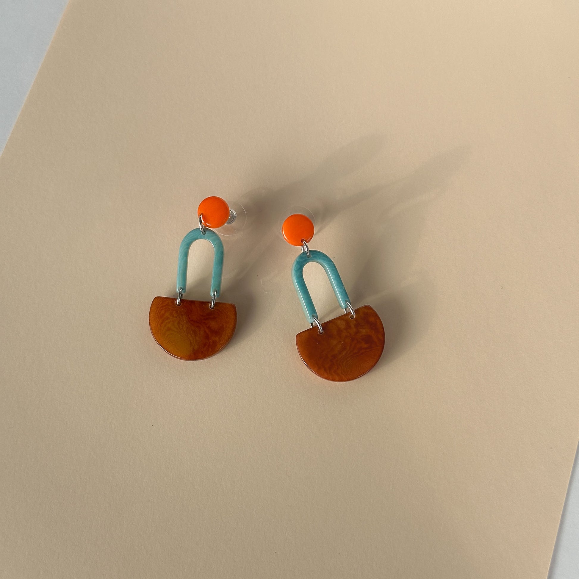 Colourful dangling earrings made with tagua nut beads