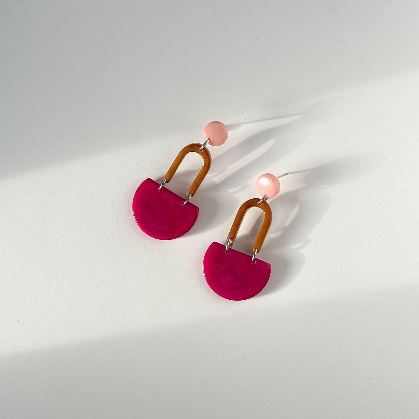 Colourful dangling earrings made with tagua nut beads