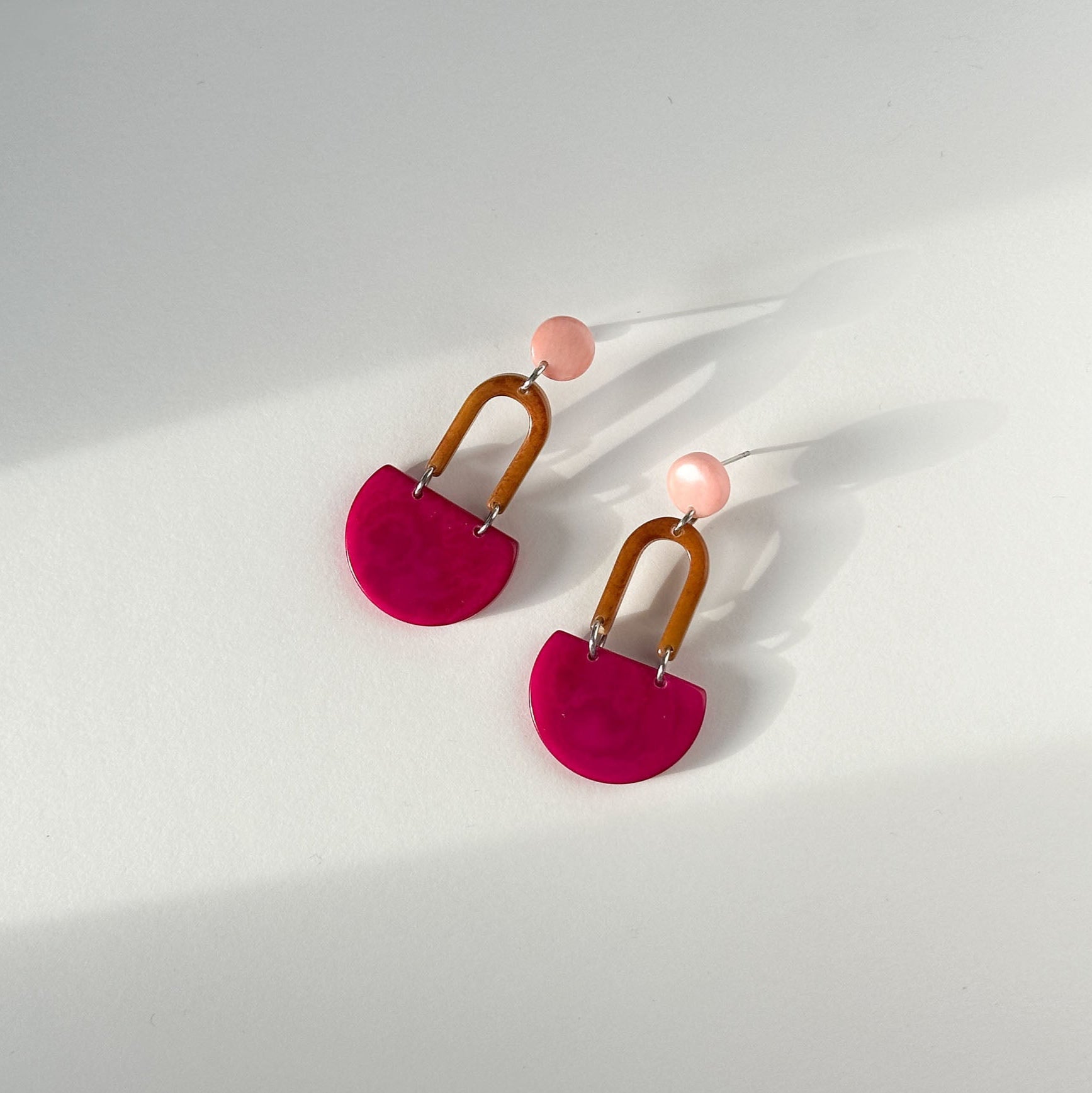Colourful dangling earrings made with tagua nut beads