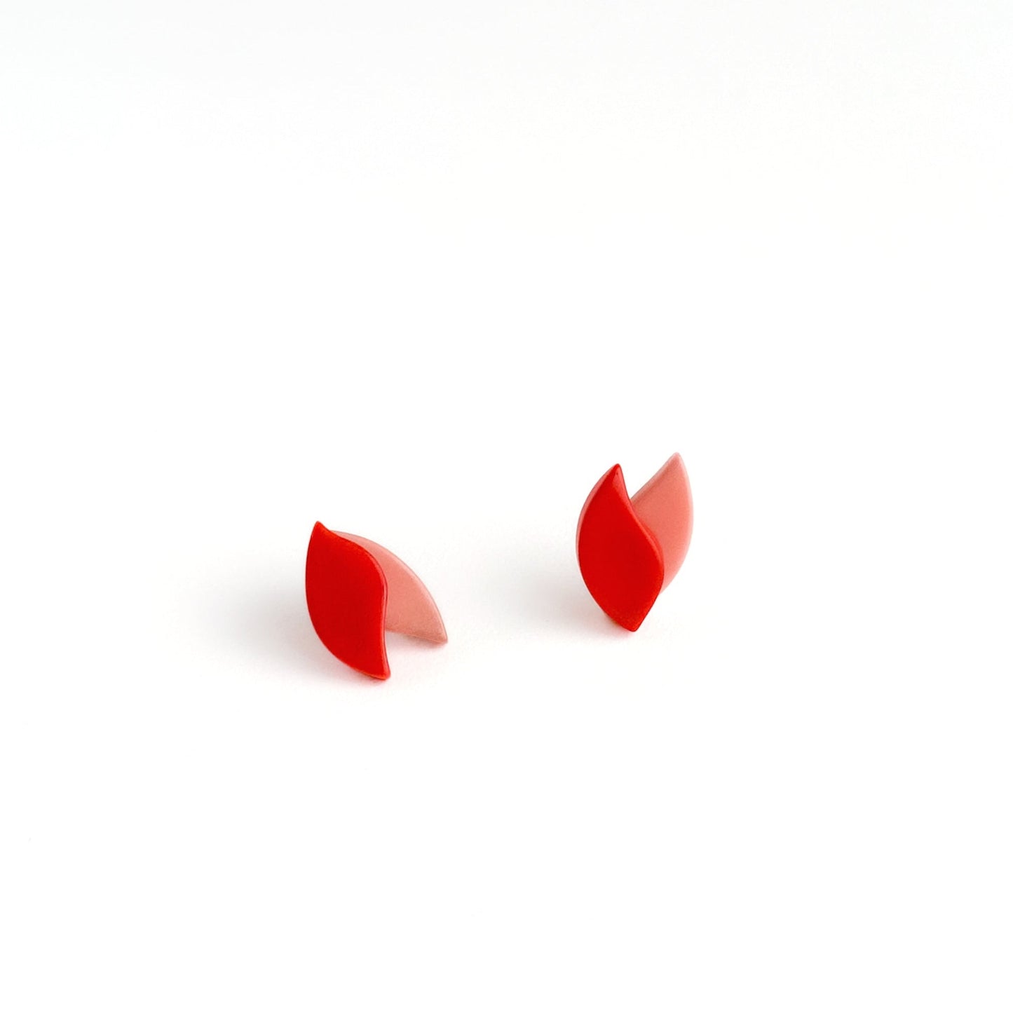 Delicate earrings shape as a lotus flower in contrasting colours