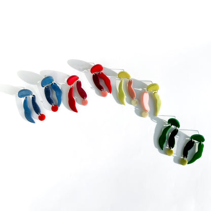 Colourful dangling earrings made with reclaimed tagua beads