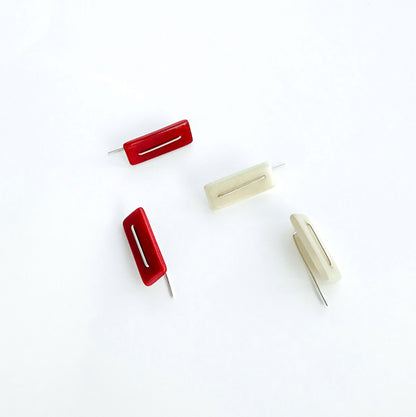Modern laser cut tagua earrings with a handmade sterling silver hook which is attached without the use of glue.