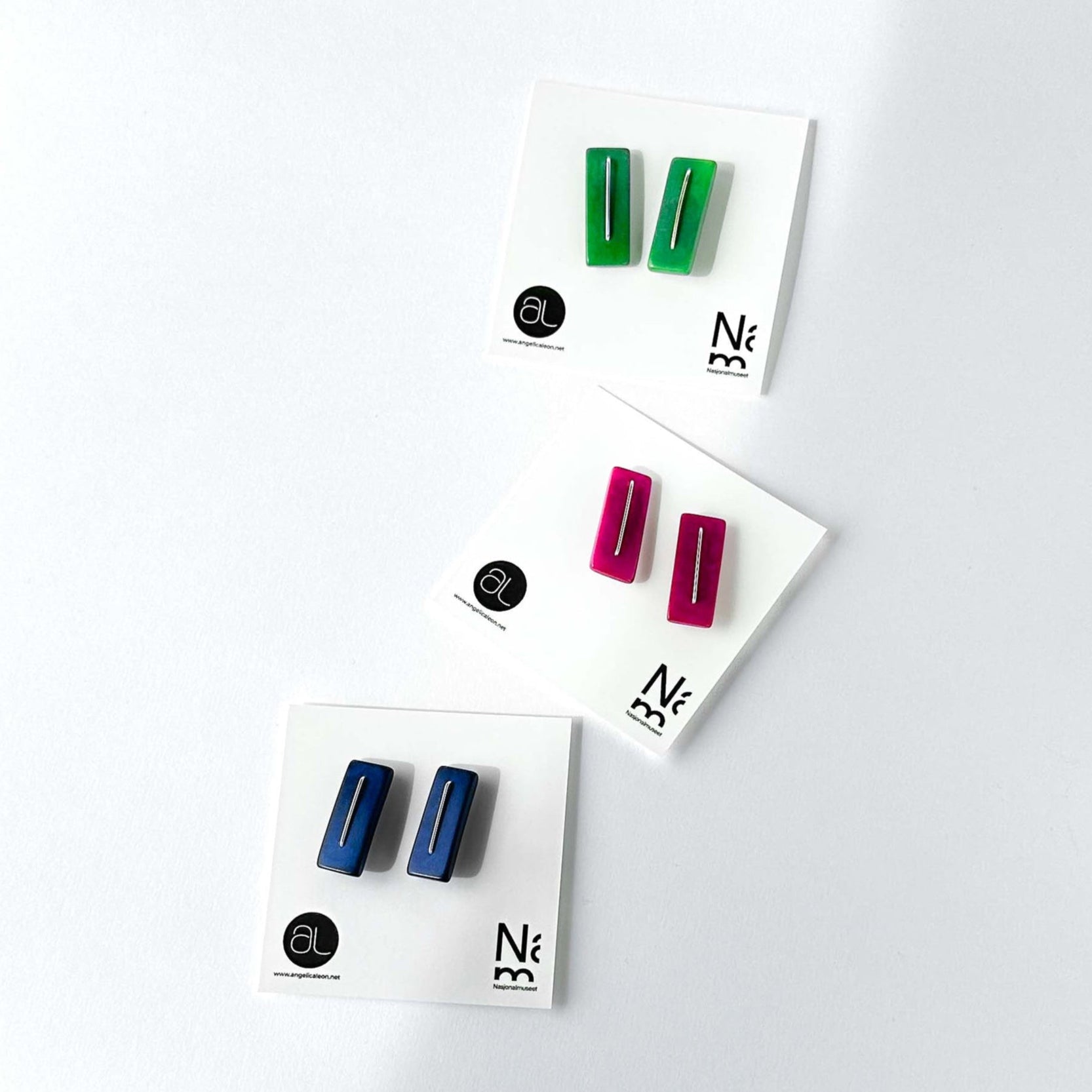 Modern laser cut tagua earrings with a handmade sterling silver hook which is attached without the use of glue.
