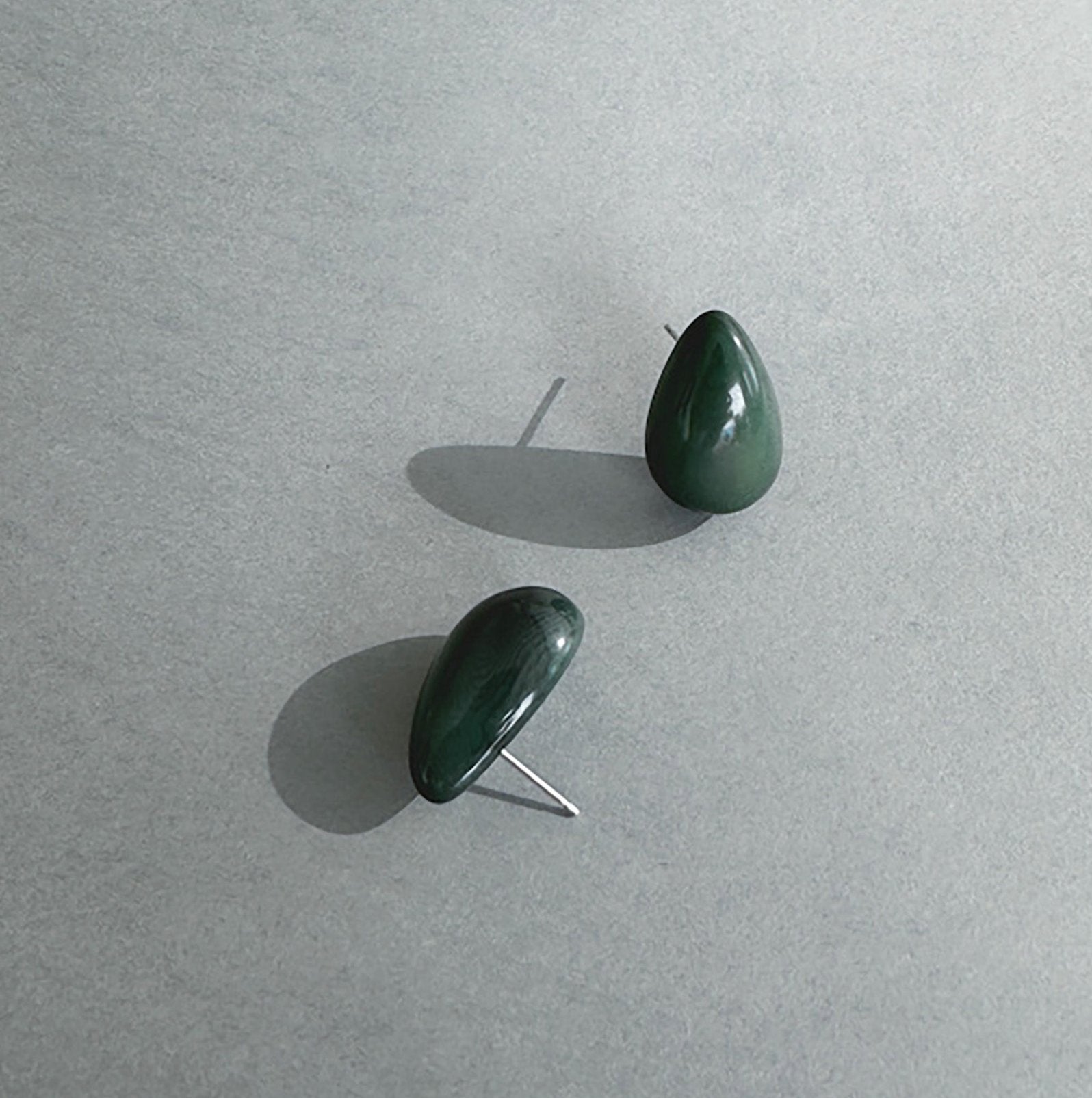 Delicate earrings in the shape of a drop, handmade with organic tagua nut.