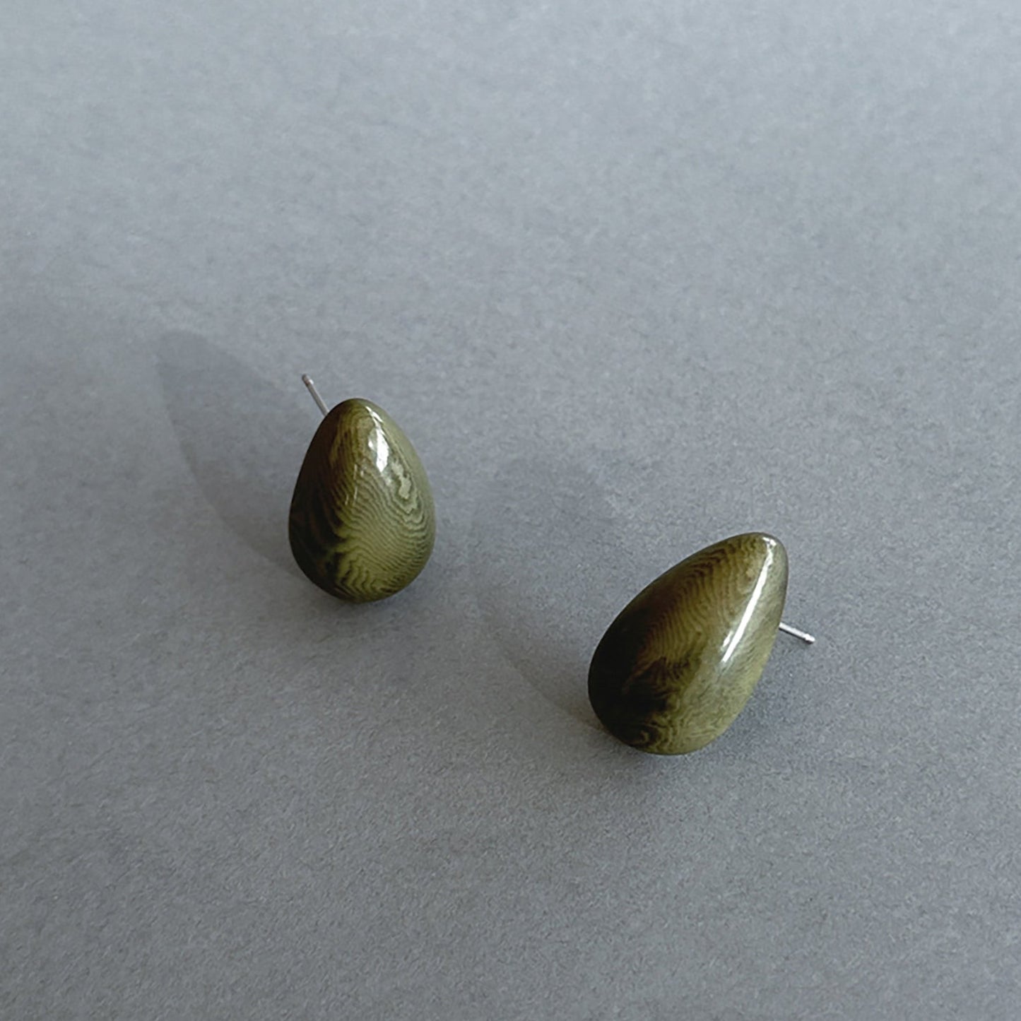 Delicate earrings in the shape of a drop, handmade with organic tagua nut.