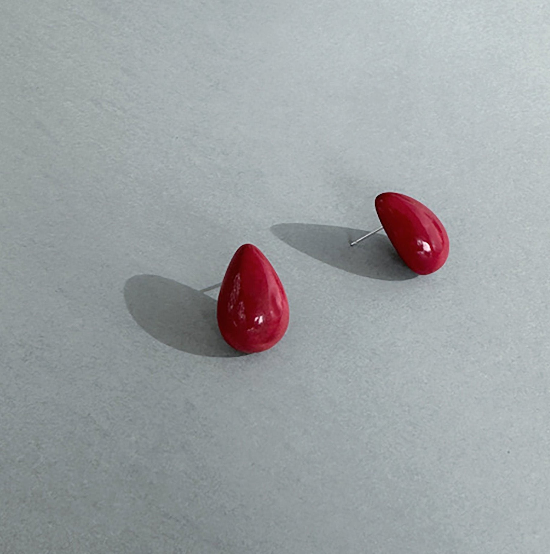 Delicate earrings in the shape of a drop, handmade with organic tagua nut.