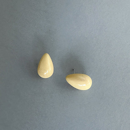 Delicate earrings in the shape of a drop, handmade with organic tagua nut.